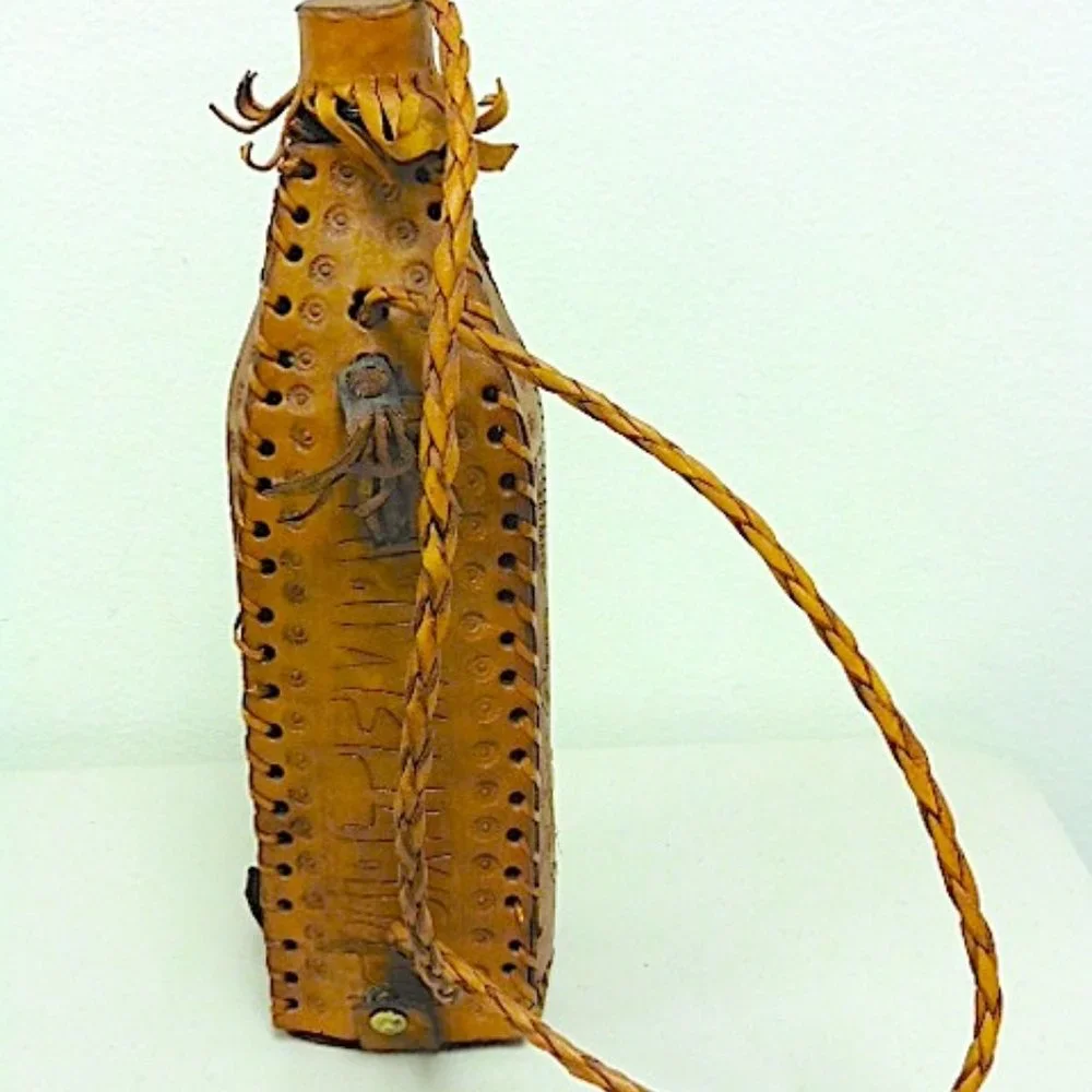 Vintage HAND TOOLED bird LEATHER BOTTLE HOLDER strap barware